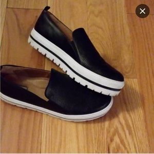 Black loafer style shoes